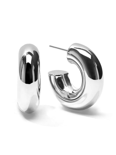 Close-up of JANE Chunky Hoops earrings made from 925 sterling silver with 18 karat gold plating